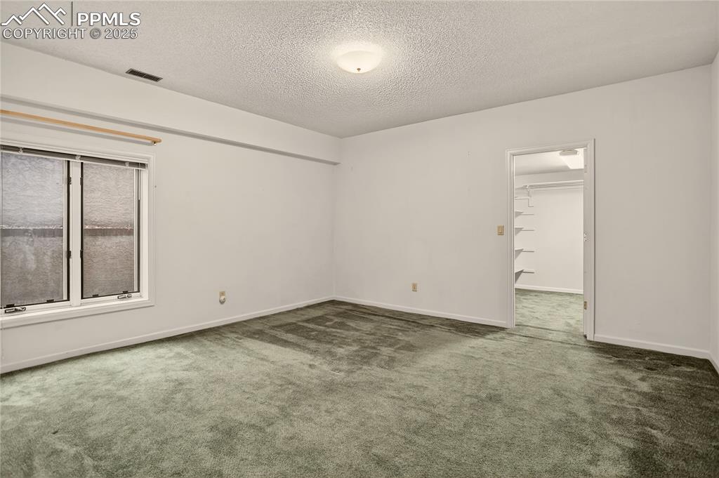 Image 31 of 41: 3rd lower level bedroom