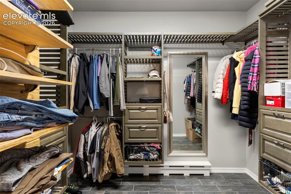 Image 21 of 46: Spacious closet featuring wood finish floors