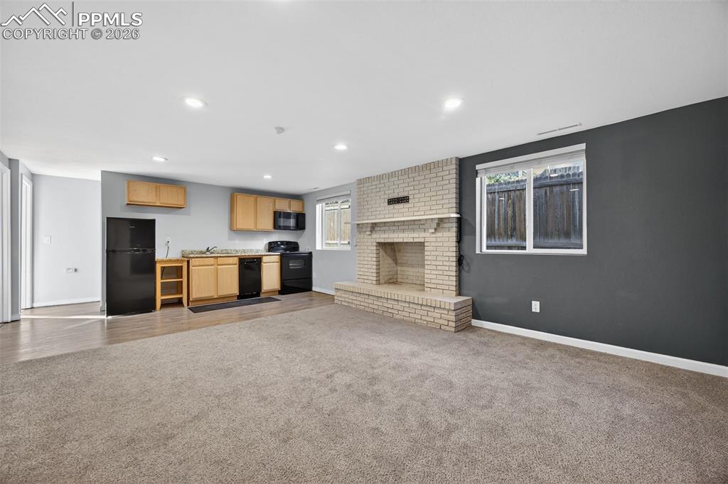 Image 25 of 50: Lower level, own kitchen, bath and bedroom