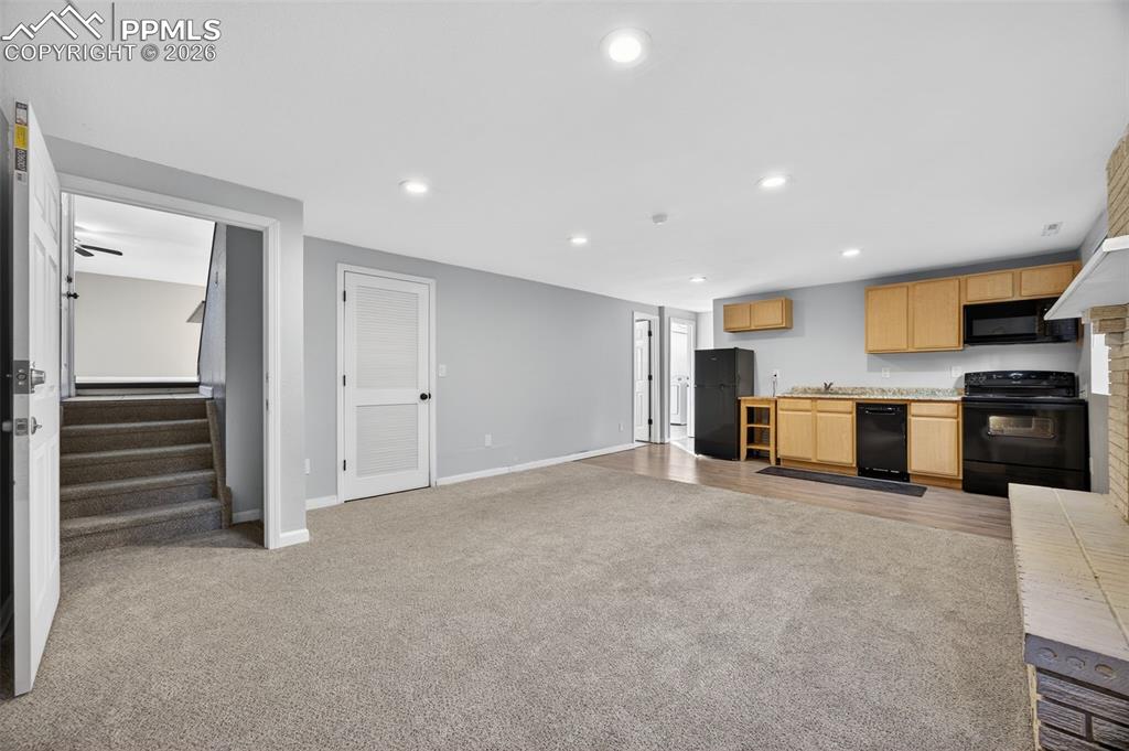 Image 26 of 50: Lower level, own kitchen, bath and bedroom