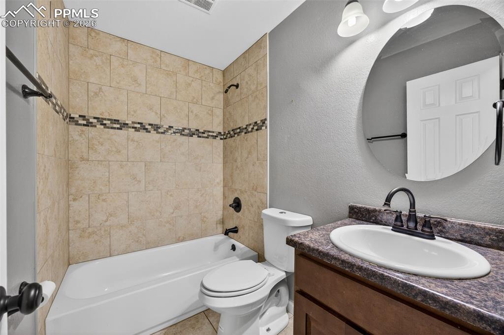 Image 30 of 50: Lower bathroom