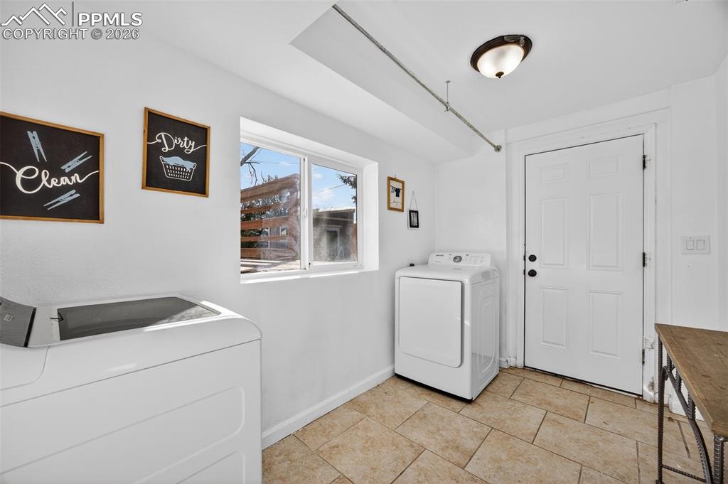 Image 32 of 50: Separate entrance for downstairs unit