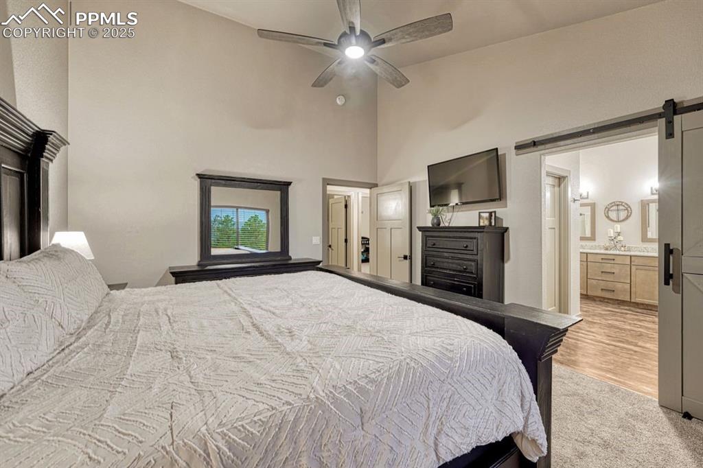 Image 17 of 32: Another thoughtful touch in the primary suite, 3-way switches from the door