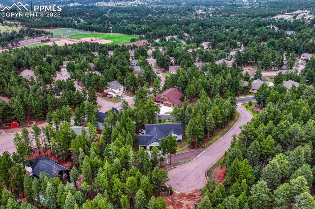 Image 30 of 32: Crestview Lane is a private road with wooded lots 