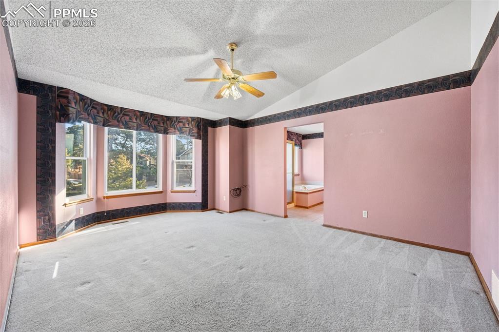 Image 23 of 50: Master Bedroom