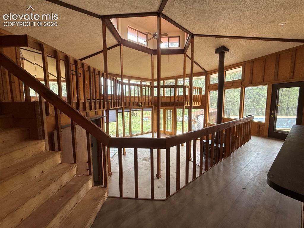 Image 3 of 33: Entry over looking Family room and loft