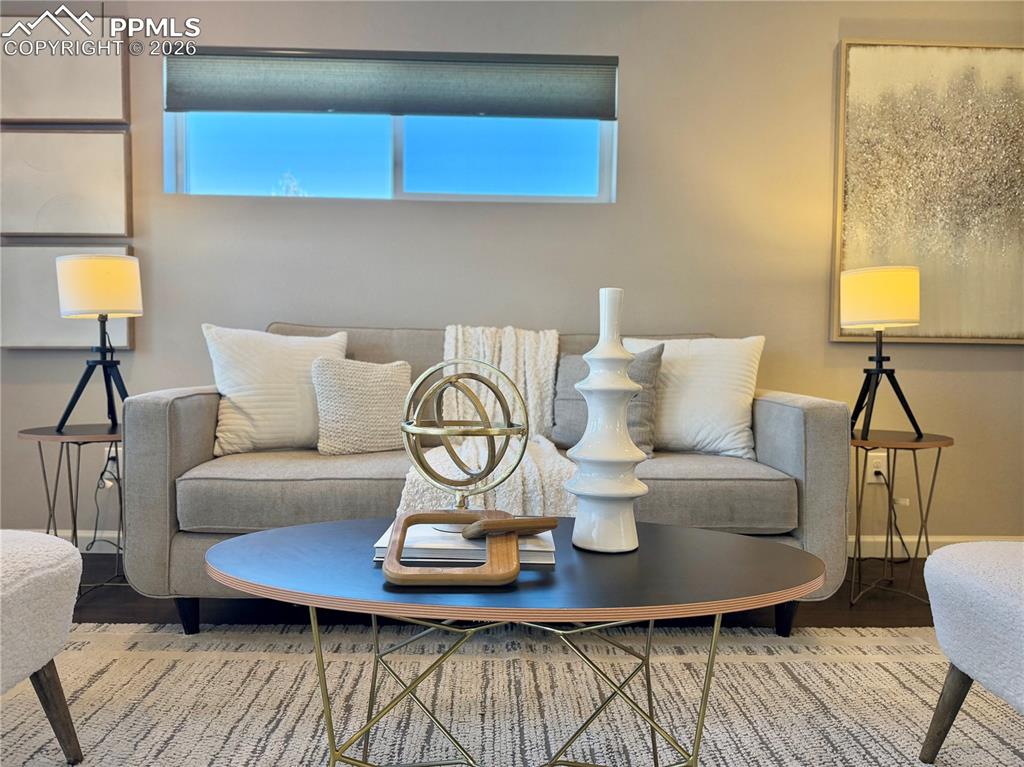 Image 5 of 41: Living room featuring healthy amount of natural light