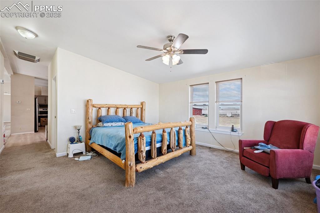 Image 45 of 45: Large family room, temporarily setup as bedroom.