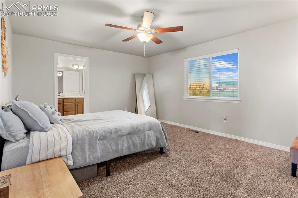 Image 13 of 25: Master Bedroom