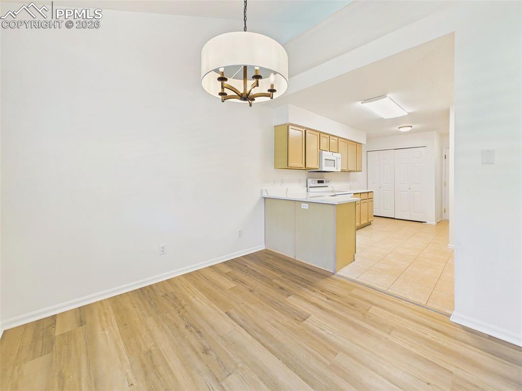 Image 13 of 50: Dining Area (Alternate View) – Bright and inviting dining space positioned 