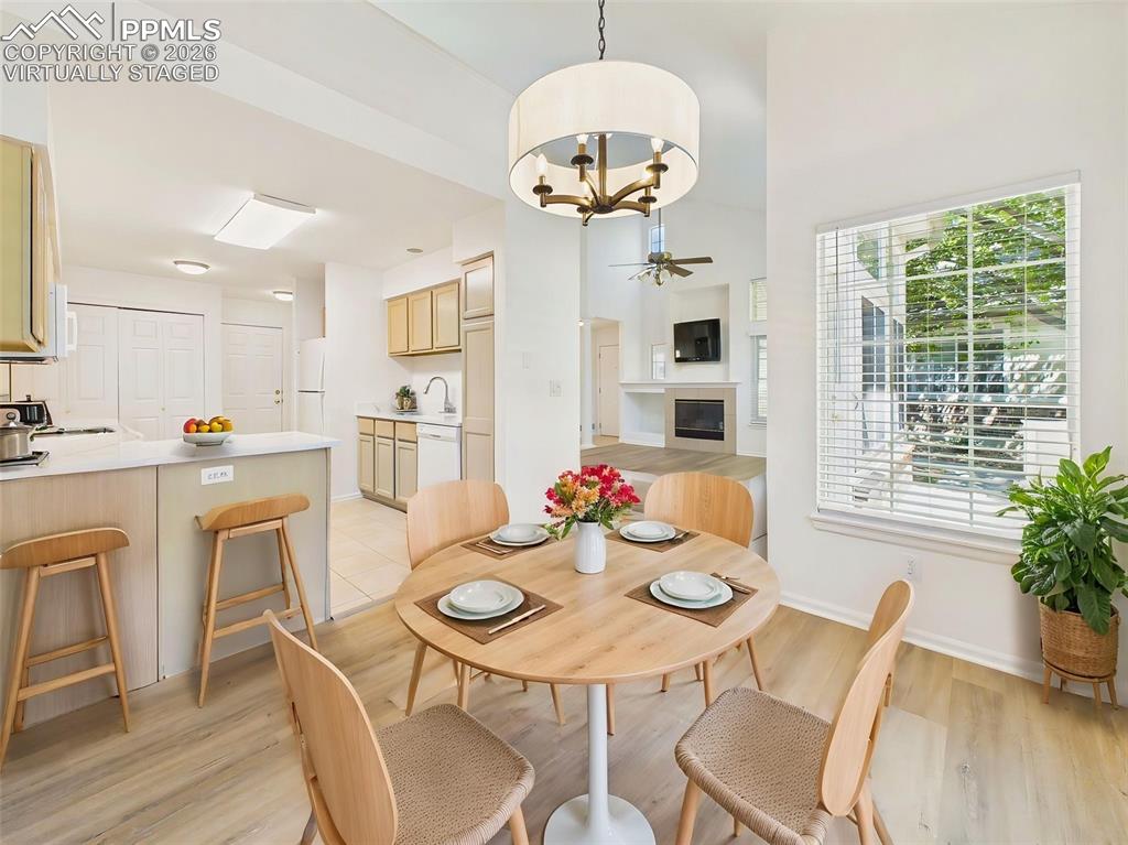 Image 16 of 50: Virtually Staged Open kitchen with breakfast bar seating, perfect for casua
