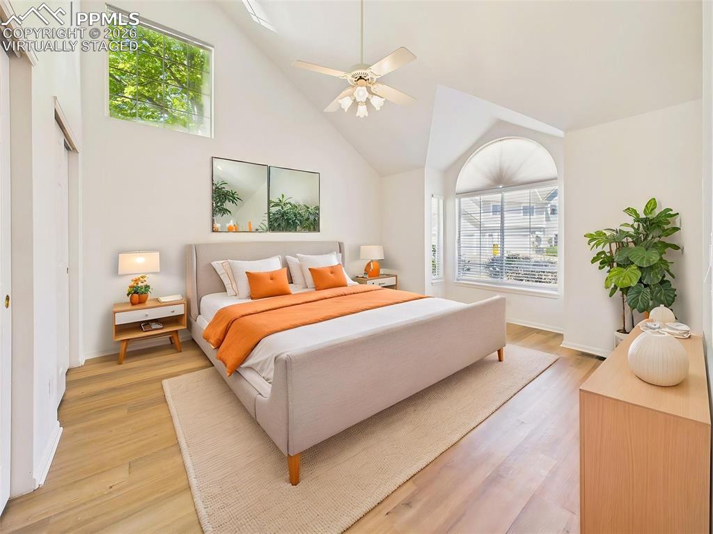 Image 23 of 50: Virtually Staged Primary Bedroom (Alternate Angle) – Spacious primary retre