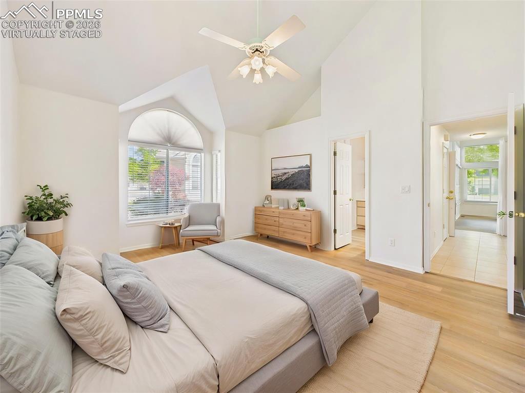 Image 25 of 50: Virtually Staged Expansive primary suite featuring vaulted ceilings, large 