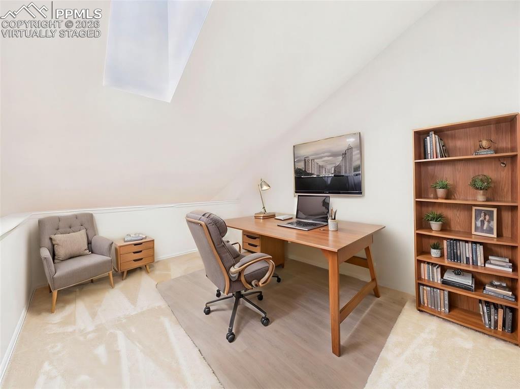 Image 31 of 50: Virtually Staged Loft / Office (Staged) – Functional loft setup with worksp