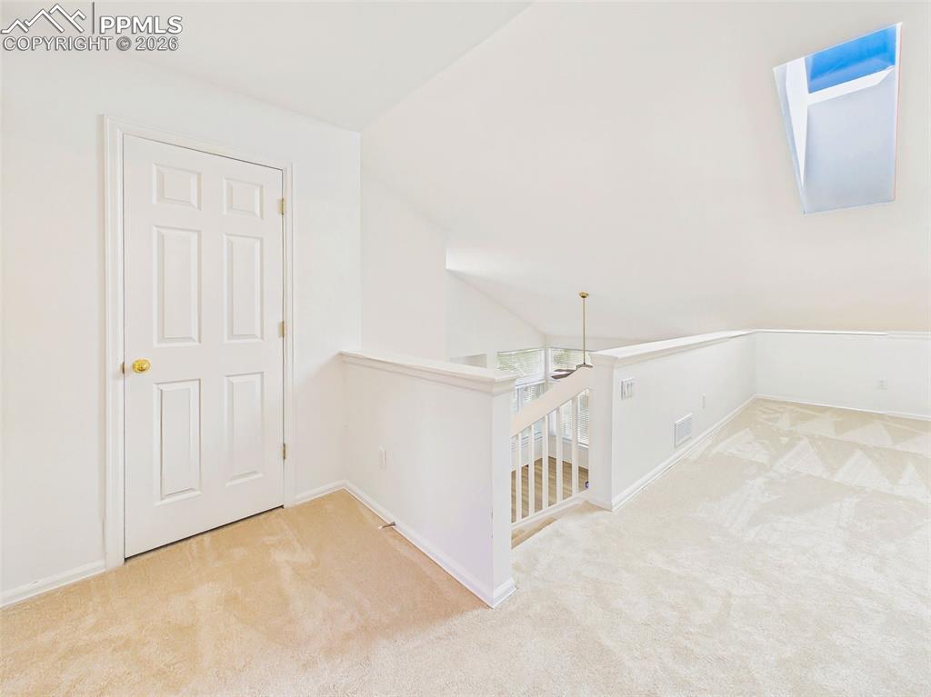 Image 33 of 50: Loft / Bonus Area – Versatile upper-level loft space overlooking the main l