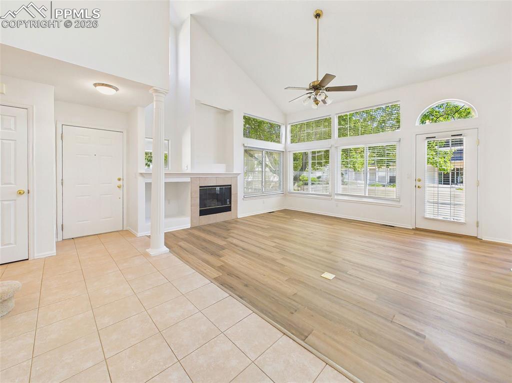 Image 4 of 50: Living Room – Open layout from the entry highlights the seamless flow betwe