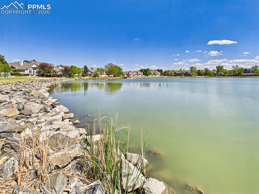Image 48 of 50: Lake View – Scenic community lake surrounded by walking paths and nearby ho