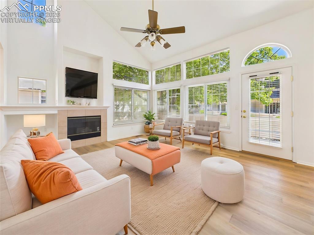 Image 6 of 50: Virtually Staged Dramatic ceiling height and oversized windows create a bri