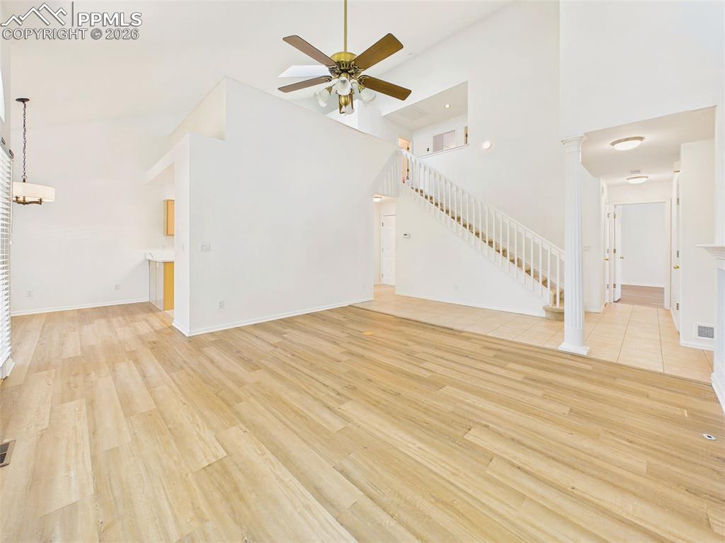 Image 9 of 50: Living Room (Alternate View) – Spacious main living area with fresh paint a