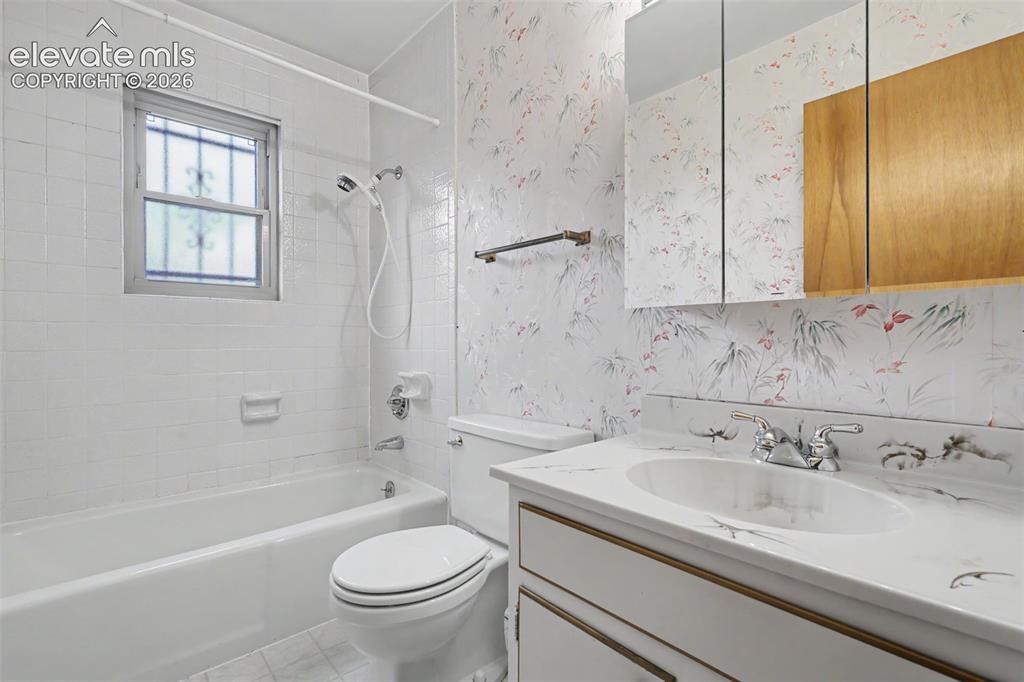 Image 14 of 37: Main level bathroom
