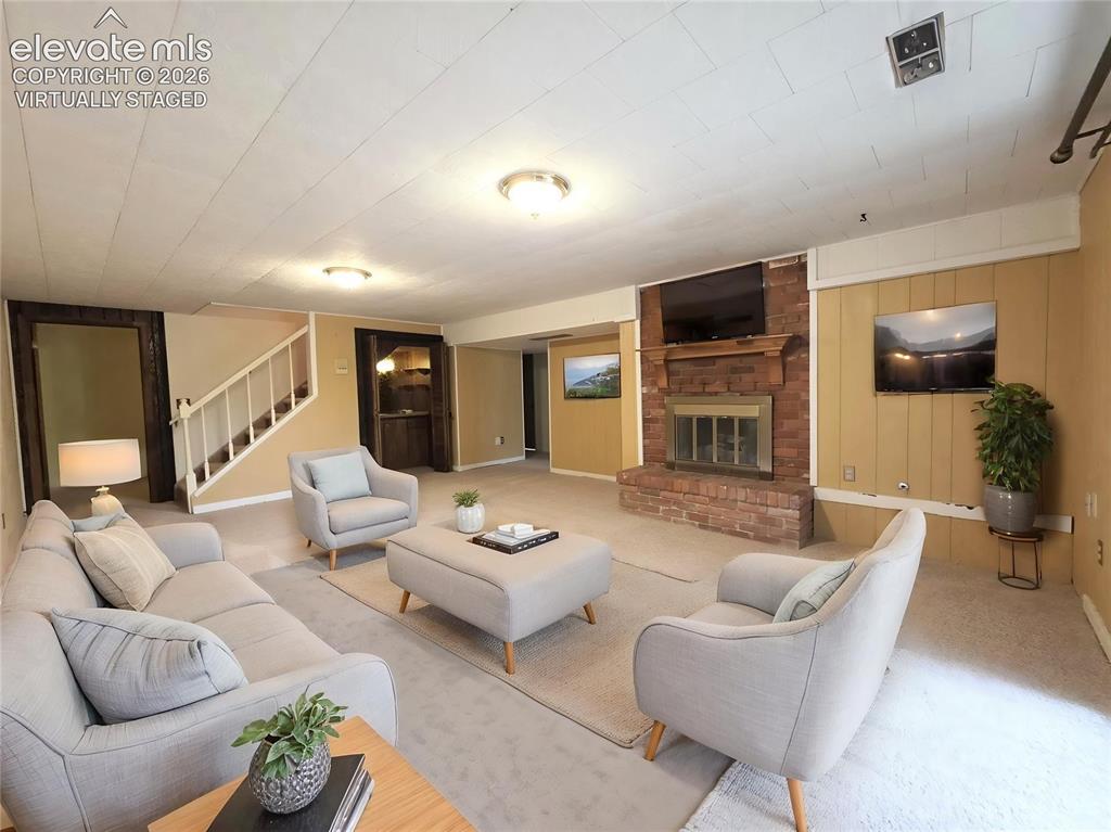 Image 22 of 37: Lower level virtually staged