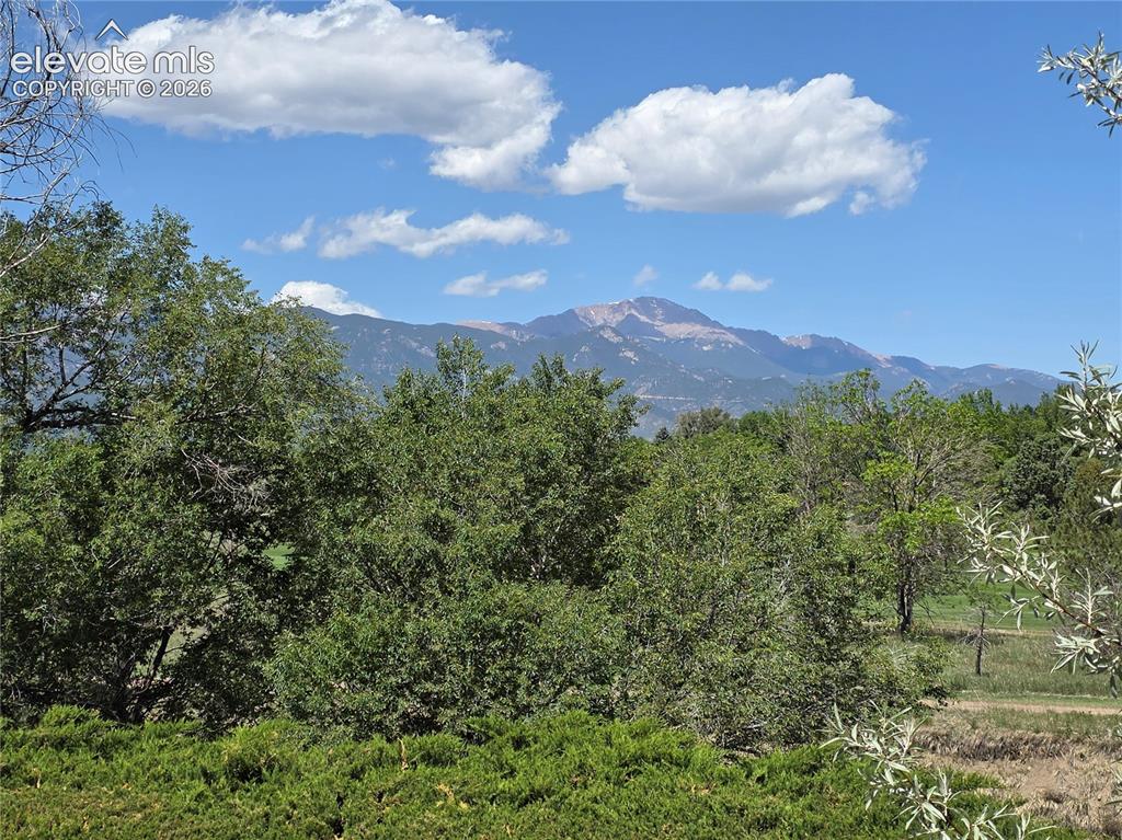 Image 32 of 37: Pikes Peak from deck