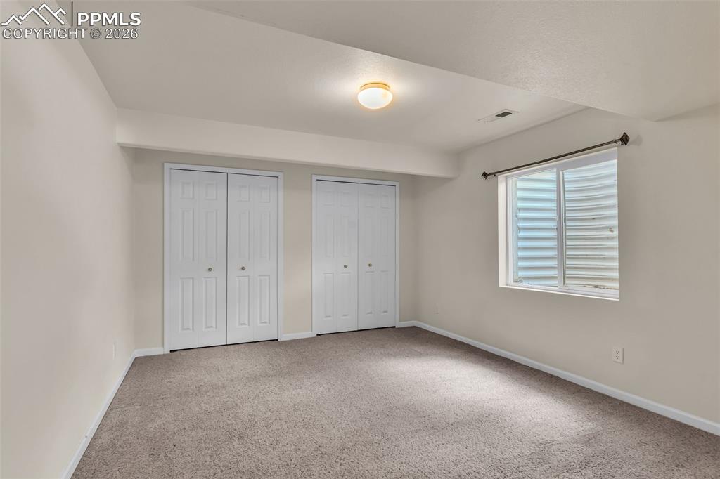 Image 31 of 38: Bedroom