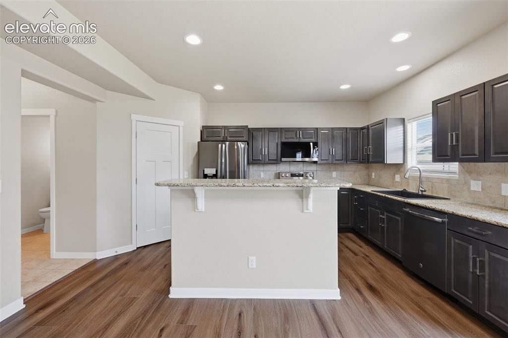 Image 13 of 34: The finished lower level adds substantial usable living space with flexibil