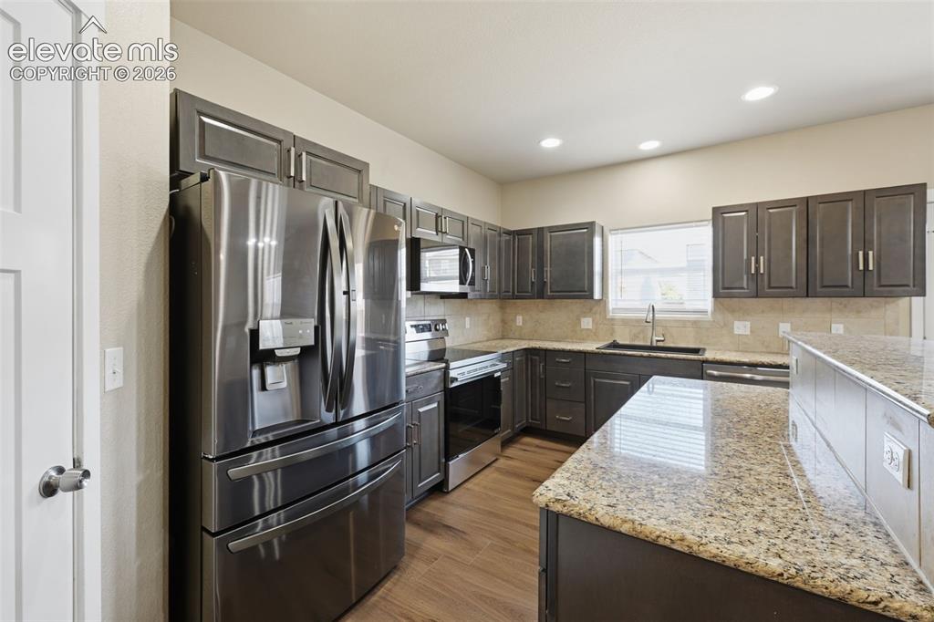 Image 14 of 34: Virtually staged to demonstrate the loft as a comfortable second living, me