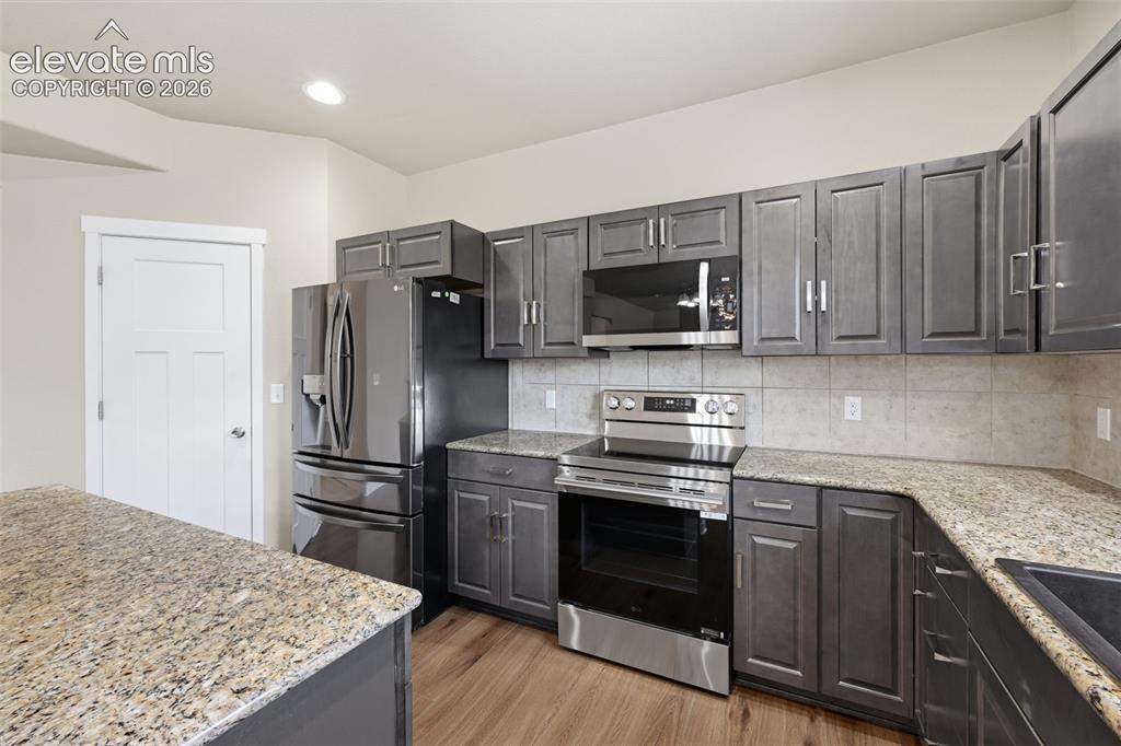 Image 15 of 34: A generous upper-level loft provides valuable separation from the main livi