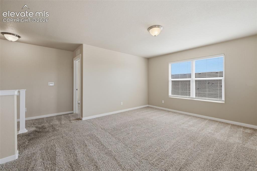 Image 20 of 34: Generous counter space and stainless-steel appliances make the refreshed ki