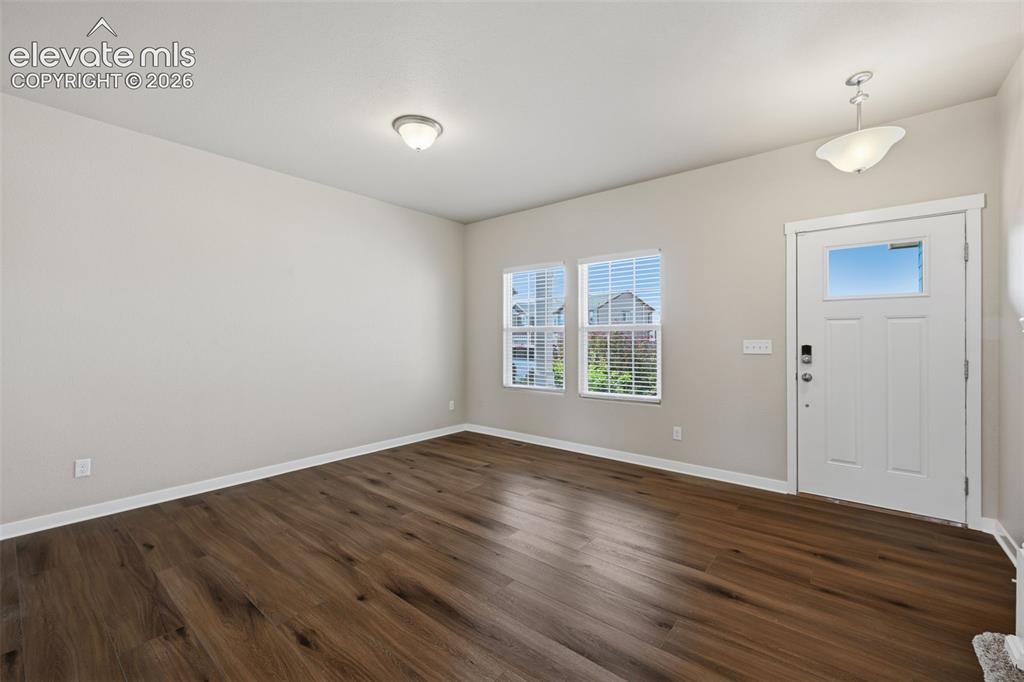 Image 5 of 34: Granite countertops, abundant cabinetry, stainless-steel appliances and a b