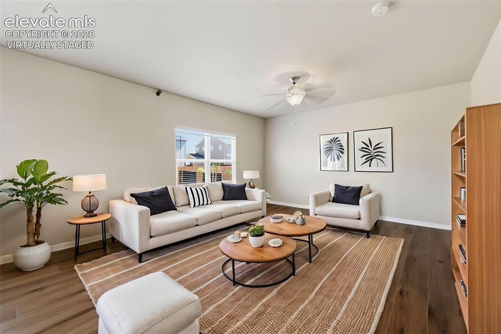 Image 7 of 34: Virtually staged to demonstrate the generous scale of the primary suite, wi