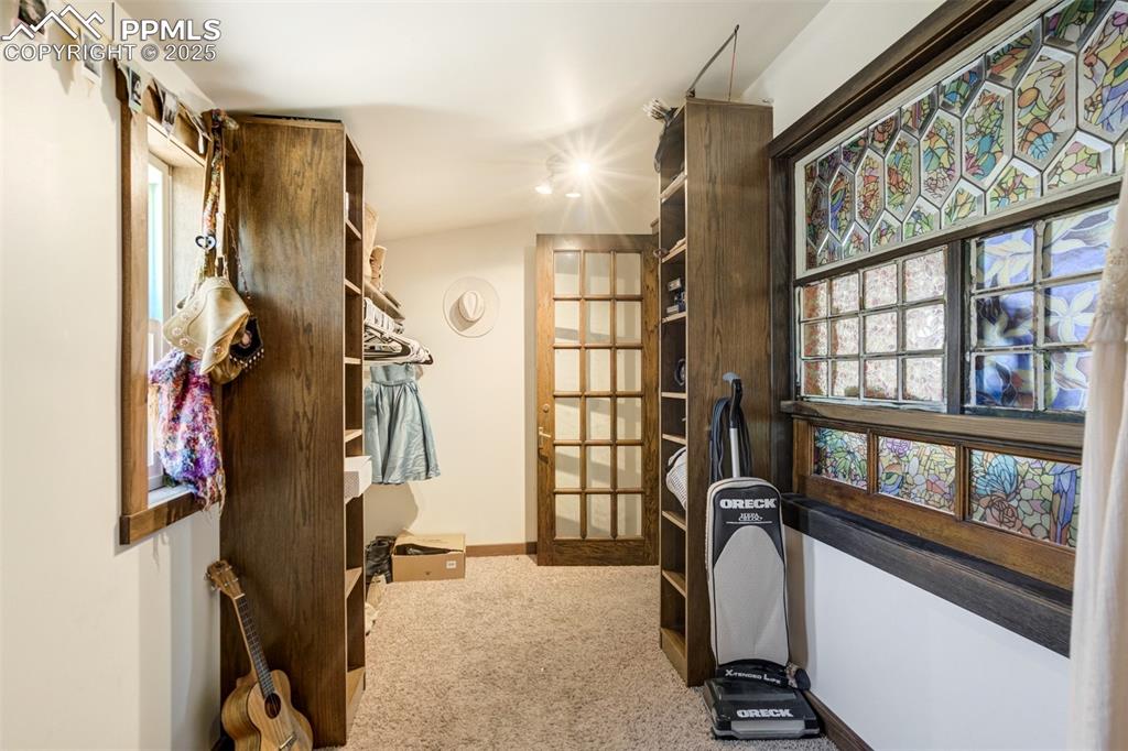 Image 19 of 50: Walk-in closet of Primary Bedroom, 6