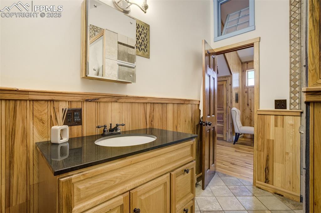 Image 47 of 50: ADU has a bathroom with a shower and a tub