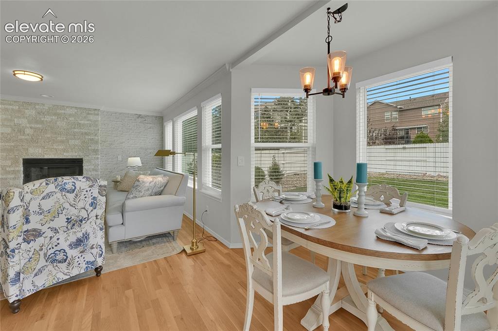 Image 11 of 35: Family room and eat-in bay window area.