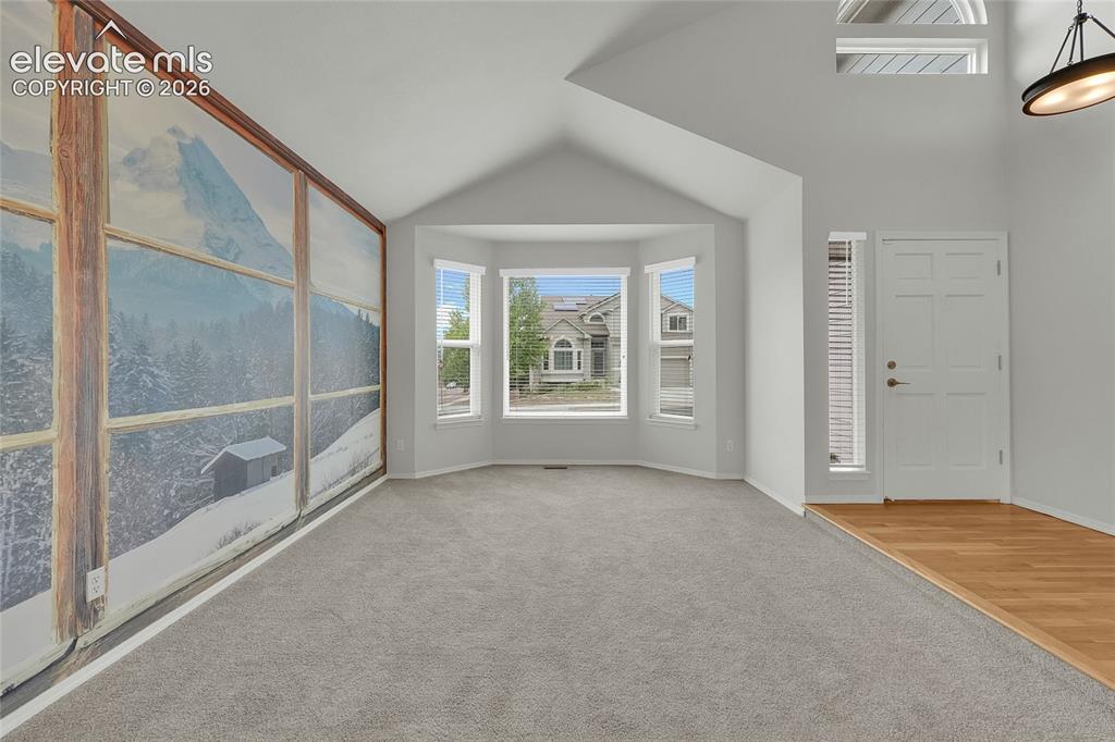 Image 6 of 35: Cathedral ceilings, mountain scene mural 