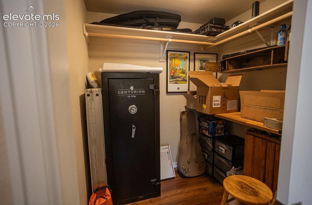 Image 29 of 40: Closet to studio living space