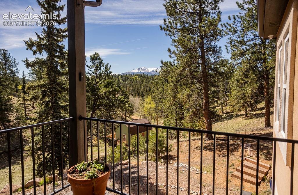 Image 8 of 40: View of Pikes Peak from front deck