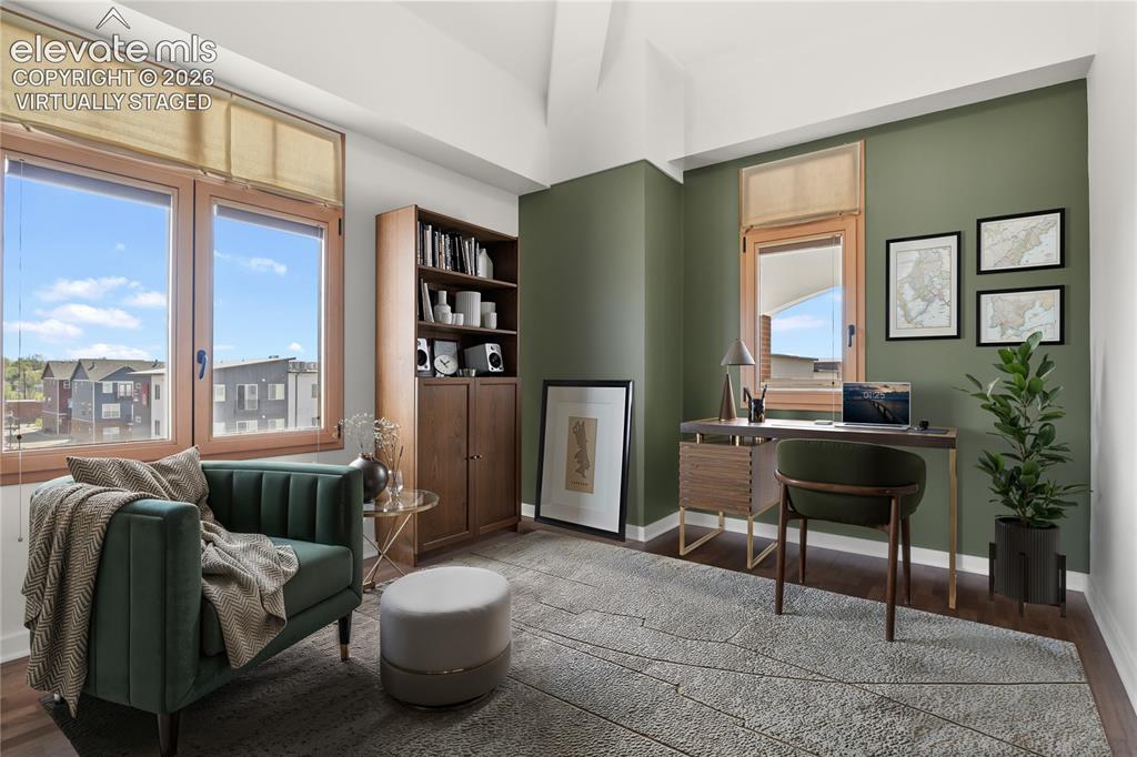 Image 16 of 50: Main level second bedroom. Virtually Staged