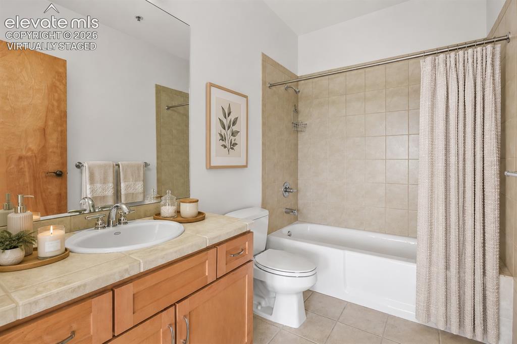 Image 23 of 50: Upper level full bath. Virtually Staged
