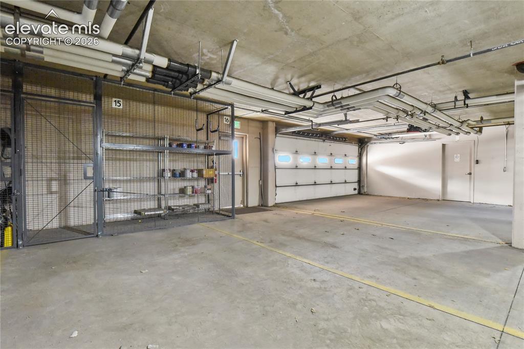 Image 31 of 50: Private underground heated garage with 2 parking spaces