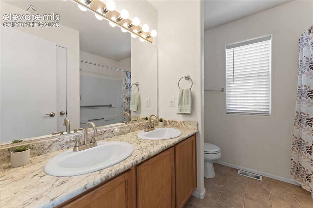 Image 12 of 22: Master Bathroom