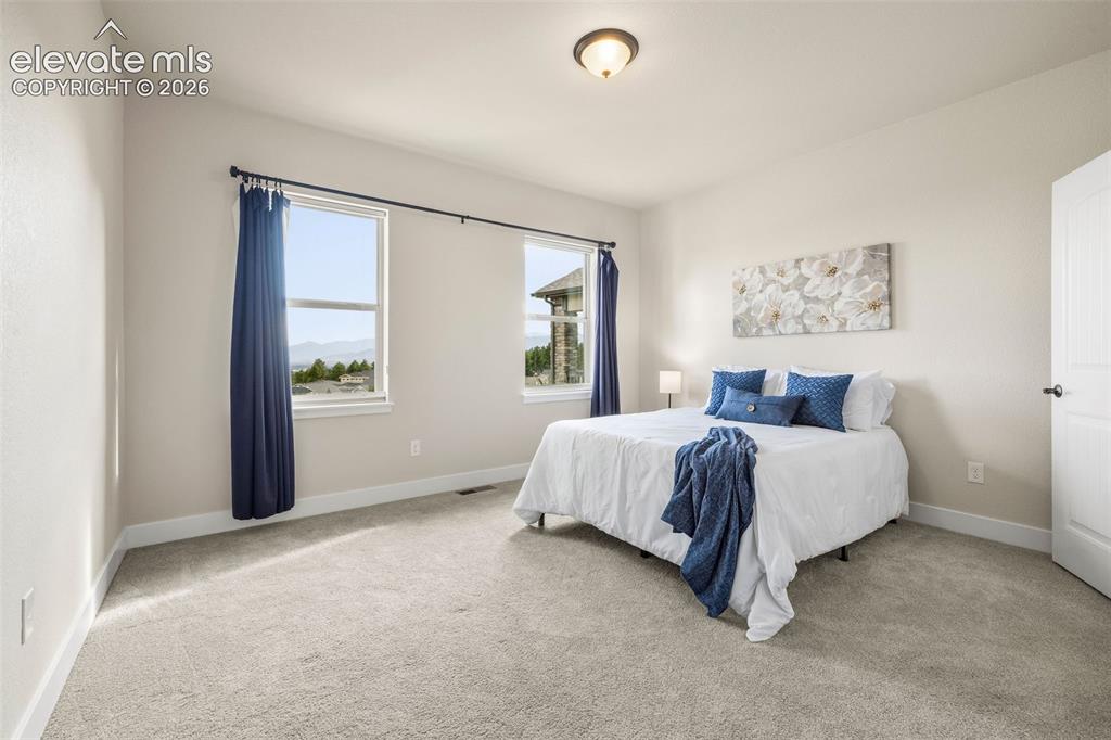 Image 11 of 50: Master Bedroom