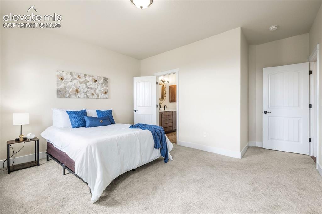 Image 12 of 50: Master Bedroom