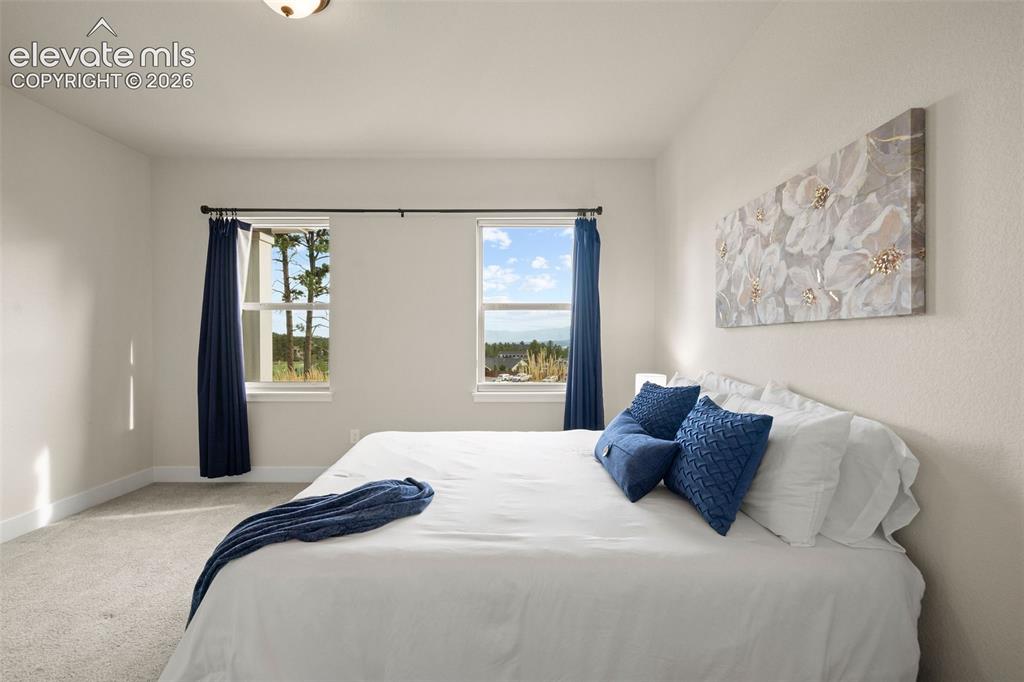 Image 13 of 50: Master Bedroom