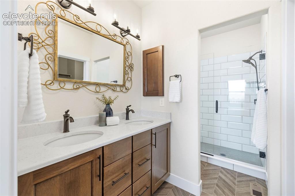 Image 14 of 50: Master Bathroom