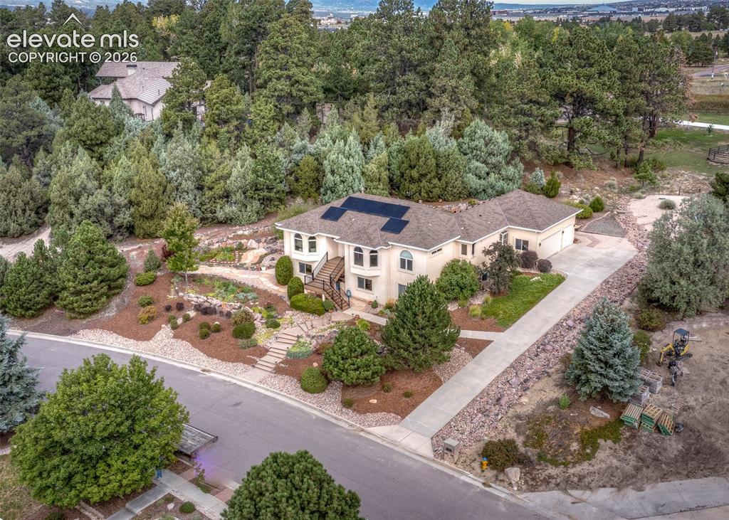 Image 2 of 50: Stately home on .68-acre elevated lot with privacy and breathtaking views!