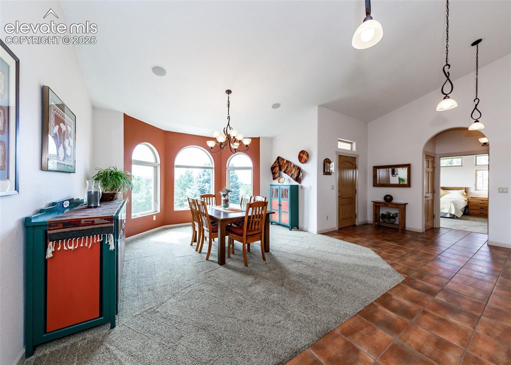 Image 22 of 50: Formal dining with plenty of room for larger gatherings. 
