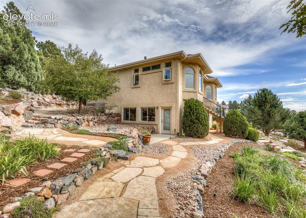 Image 39 of 43: Excellent access to the finished lower level walk-out, perfect for home off